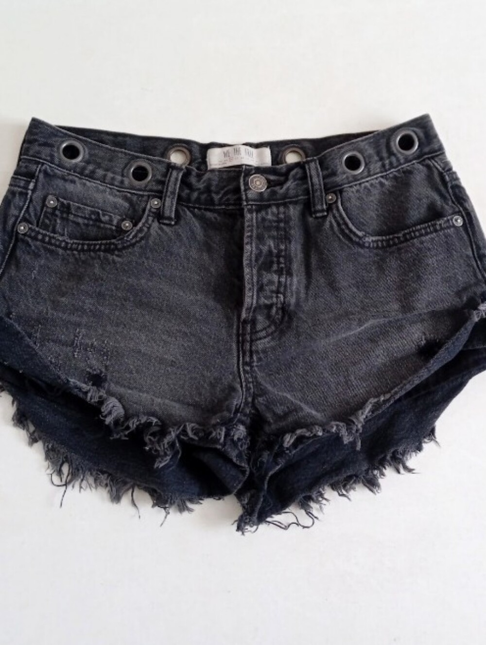 Free People We the Free black denim distressed grommet detail cut-off shorts